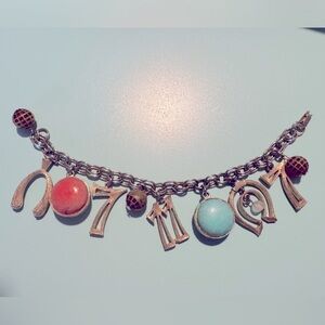 Vintage Lucky 7s and 11”s charm bracelet